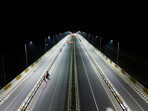 Night view of freeways with motion blur. Night highway. Ulyanovsk (Simbirsk), Russia - September 25, 2021.