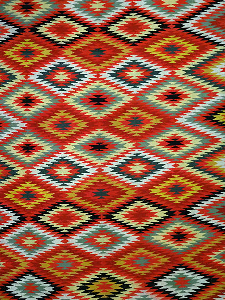 Diamond pattern Blanket Rug Pattern Red, Orange, White, Green, Black, and blue Diamond Blanket/ Rug - Navajo Artist, made about 1885 of cotton and wool. navajo culture stock pictures, royalty-free photos & images