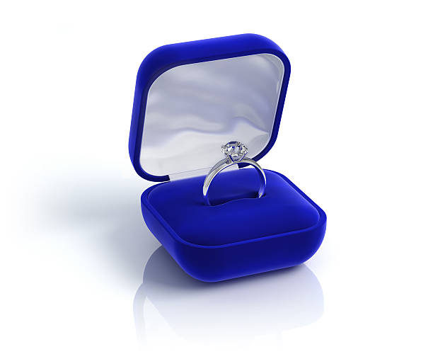 Diamond ring Diamond ring in a blue box - 3d render wedding ring box stock pictures, royalty-free photos & images