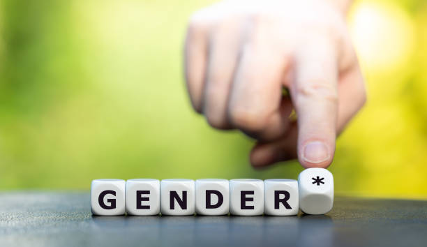Dice form the expression "gender*" (gender star). A symbol for a gender equitable administrative language in Germany. stock photo