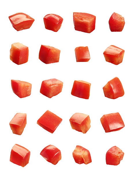 Diced Tomatoes isolated Diced Tomatoes isolated on white background chopped food stock pictures, royalty-free photos & images