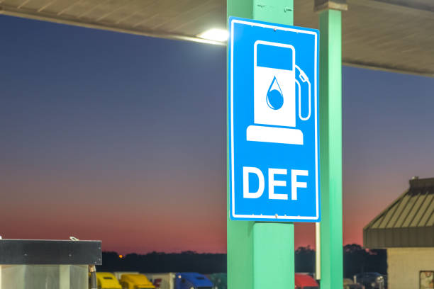 Diesel exhaust fluid or DEF sign posted in a truck stop, next to fuel pump Diesel exhaust fluid or DEF sign posted in a truck stop, next to fuel pump diesel fuel stock pictures, royalty-free photos & images