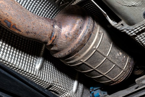 A Diesel Particulate Filter In The Exhaust System In A Car On A Lift In