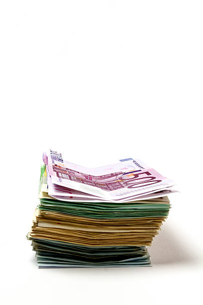 Different euro bills are stacked on a pack stock photo