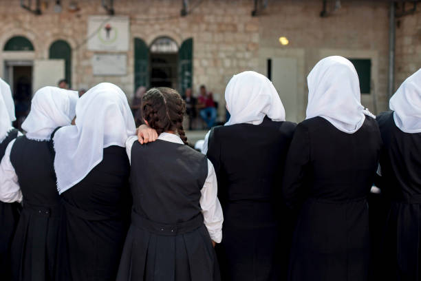 different girl A group of girls from behind, watch representation at their school in the city of Jerusalem alcaraz stock pictures, royalty-free photos & images