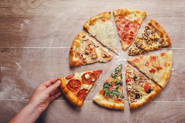 Different slices of pizza stock photo