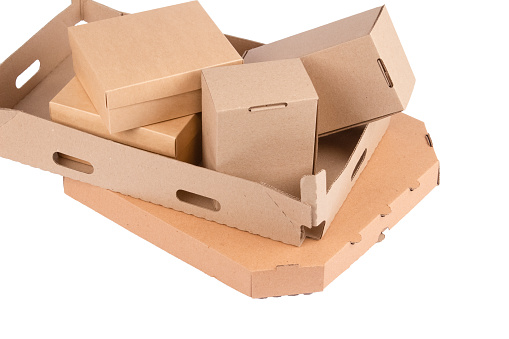 Different types of cardboard boxes isolated on white. Carton boxes for storaging fruits or other goods, gift boxes, pizza box for your presentation or website, sustainable packaging concept