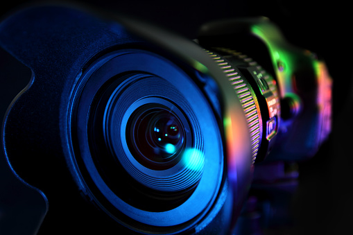 Digital camera illuminated with multicolor light.