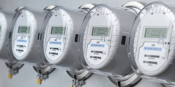 Digital electric meters in a row measuring power use. Electricity consumption concept. Digital electric meters in a row measuring power use. Electricity consumption concept. 3d illustration fuel and power generation stock pictures, royalty-free photos & images