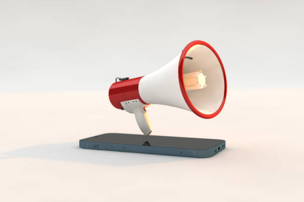 Digital Marketing a megaphone and smartphone on white background stock photo