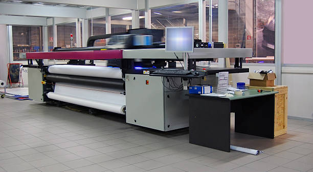 Digital printing - wide format Digital printing system for printing a wide range of superwide-format applications. These printers are generally roll-to-roll and have a print bed that is 2m to 5m wide. Mostly used for printing billboards and generally have the capability of printing between 60 to 160 square metres per hour. printing plant stock pictures, royalty-free photos & images