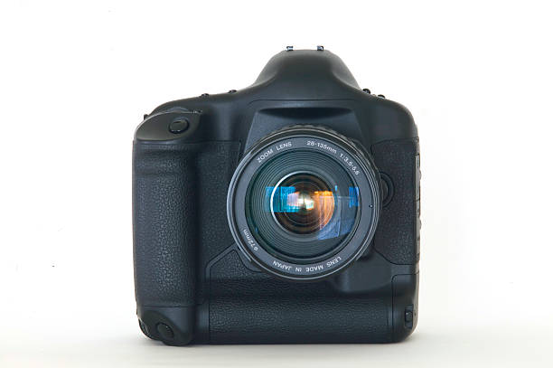 Digital SLR camera and zoom lens stock photo