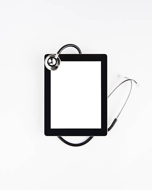 Digital tablet with stethoscope stock photo