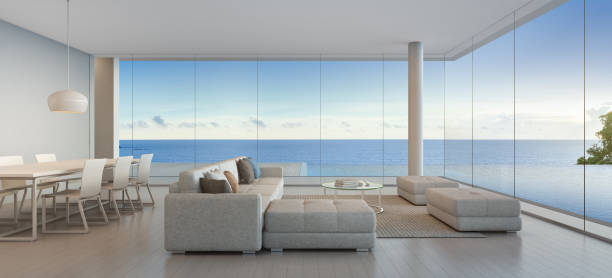 ess- und wohnzimmer von luxus strandhaus mit meerblick anzeigen schwimmbad in modernem design, ferienhaus für große familie - penthouse stock-fotos und bilder