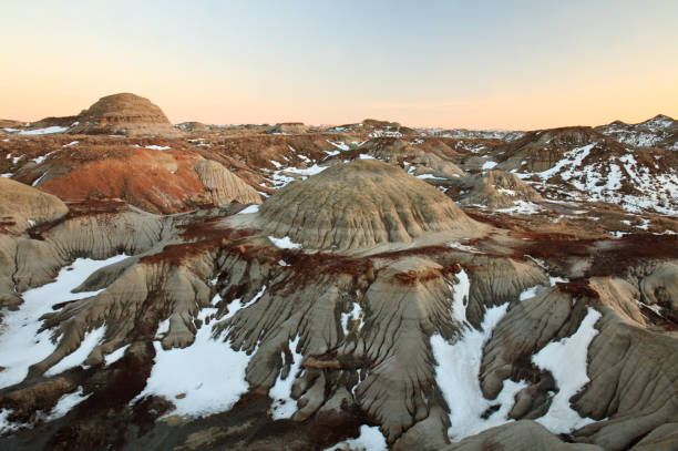 Dinosaur Provincial Park Badlands Scenic A winter scenic of Dinosaur Provincial Park near Brooks, Alberta, Canada. These are some of the best badlands in Canada. fossil site stock pictures, royalty-free photos & images
