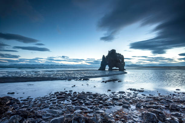 A landmark beach in Iceland called Dinosaur Rock protrudes 50 feet...