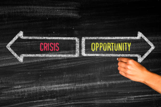Directions to the crisis and opportunity stock photo
