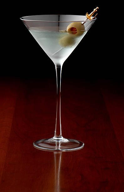 Dirty Martini with Olives The quintessential martini dirty martini stock pictures, royalty-free photos & images