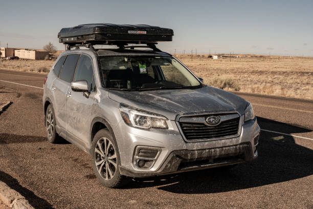 Dirty Subaru Forester With Roof Top Tent at Petrified Forest stock photo
