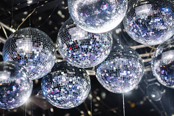disco balls on the ceiling many disco ball on a gray ceiling disco ball stock pictures, royalty-free photos & images