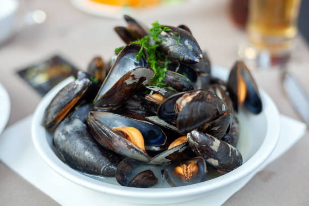 Dish with freshly prepared mussels stock photo