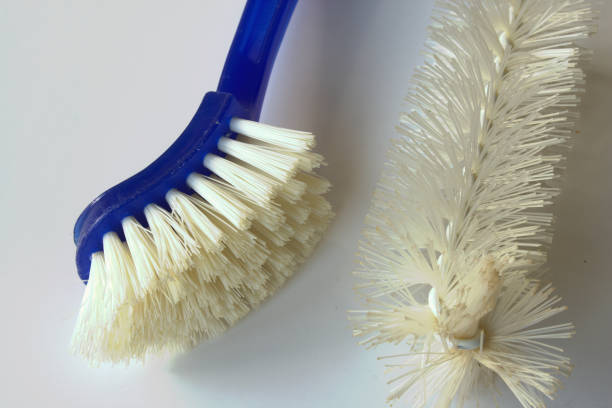 Dishwashing brushes isolated on white background stock photo