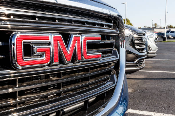 GMC SUV display at a Buick GMC dealership. GMC focuses on upscale trucks and utility vehicles and is a division of GM stock photo