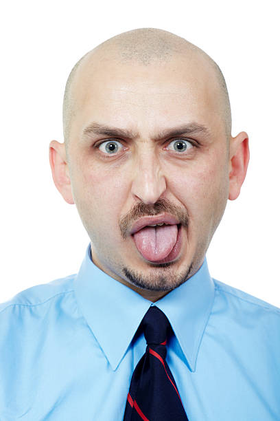Royalty Free Bald Man With His Tongue Out Pictures, Images and Stock ...