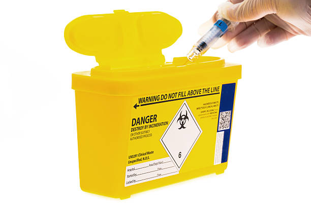 Disposable sharps waste container stock photo