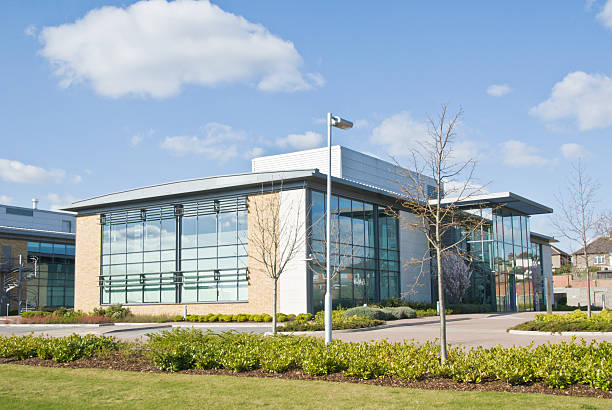 A distance shot of a glass walled office building stock photo