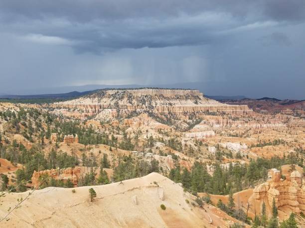 Distant Plateau Across a Canyon, Stormy Sky at Bryce Canyon stock photo