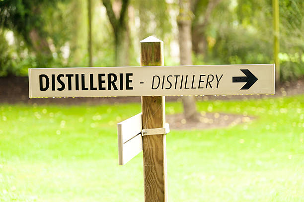 Distillery sign Distillery sign at Calvados producer, Normandy, France calvados stock pictures, royalty-free photos & images