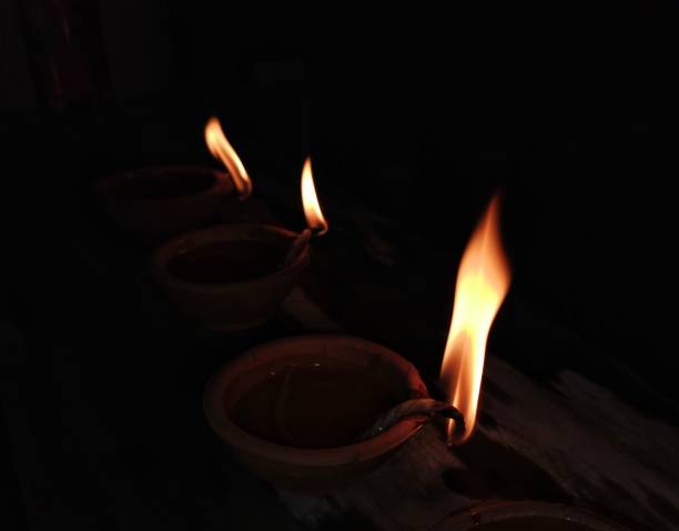 Diwali Deeyas Lighting Deyas During Divali or Diwali Celebrations 2021 in Trinidad ayodhya stock pictures, royalty-free photos & images