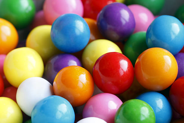 Do you want some gumballs? Closeup image of colorful gum candy. chewy stock pictures, royalty-free photos & images