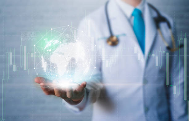 Doctor in hand holding global network connection with modern virtual screen interface. stock photo