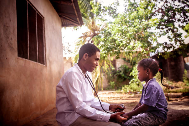 Doctor meet African child Doctor meet African child east africa stock pictures, royalty-free photos & images