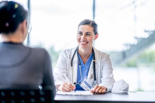 Doctor Meeting with a Patient stock photo