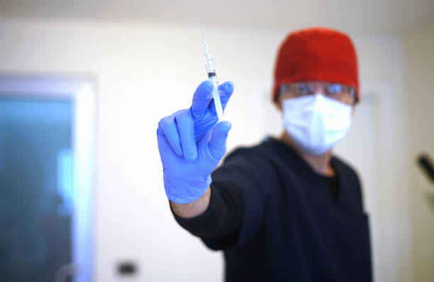 doctor preparing injection stock photo