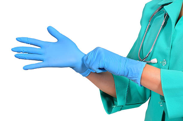 Royalty Free Doctor Gloves Pictures, Images and Stock Photos - iStock