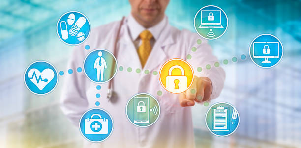 Doctor Securing Data Across Networked Devices stock photo