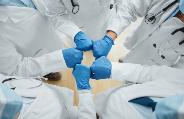 Doctors united against pandemic. stock photo