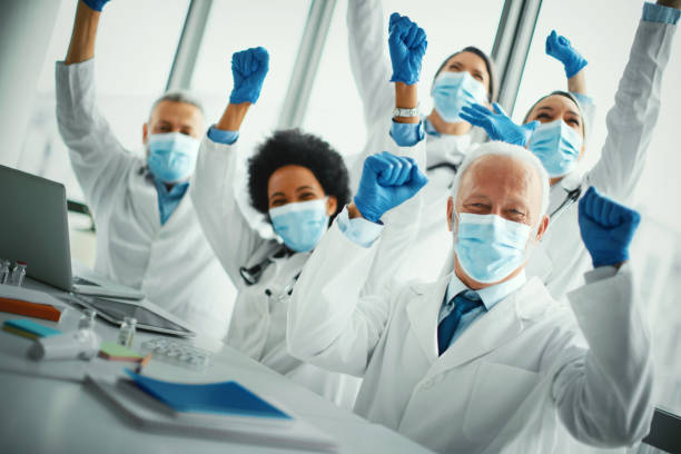 Doctors winning pandemic. stock photo