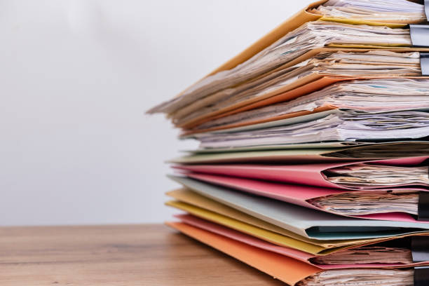 Document stacked on the office desk. stock photo