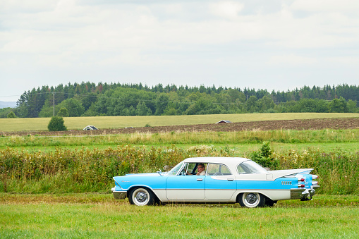 Falköping, Sweden - July 29, 2017: Dodge Coronet vintage car in the countryside