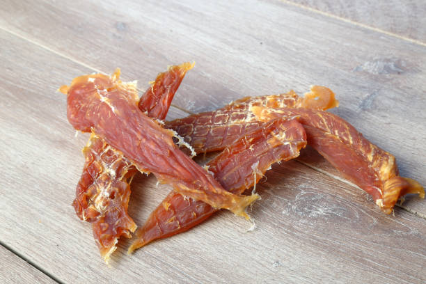 Dog treats made of Chicken Jerky which is very unhealthy to give to a dog. stock photo