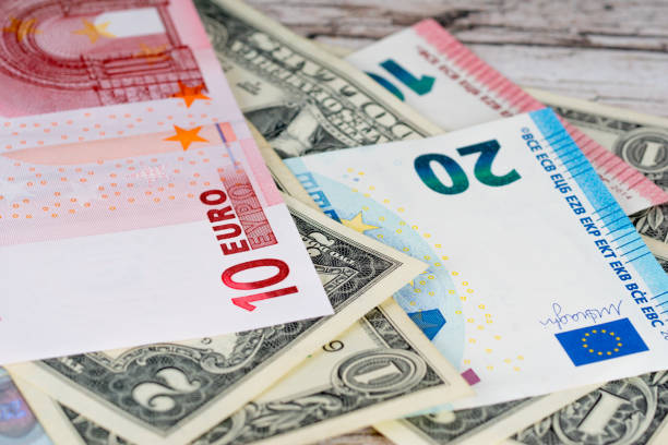 dollar and euro banknotes stock photo