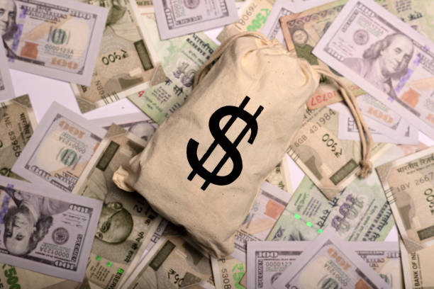 US dollar bag US dollar bag against rupees and dollar dollar  stock pictures, royalty-free photos & images