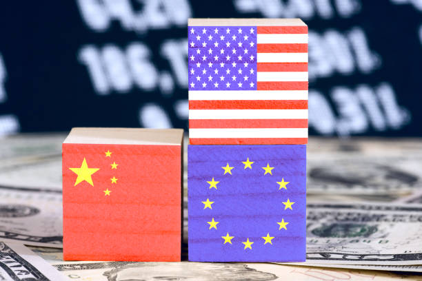 Dollar banknotes and flags of America, China and the European Union EU Dollar banknotes and flags of America, China and European Union EU europa mythological character stock pictures, royalty-free photos & images