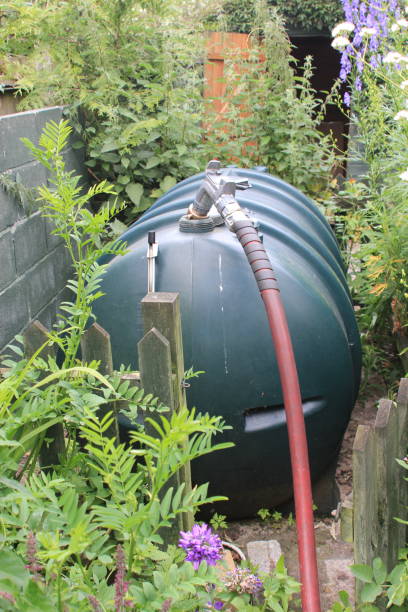 A domestic oil tank being refilled stock photo