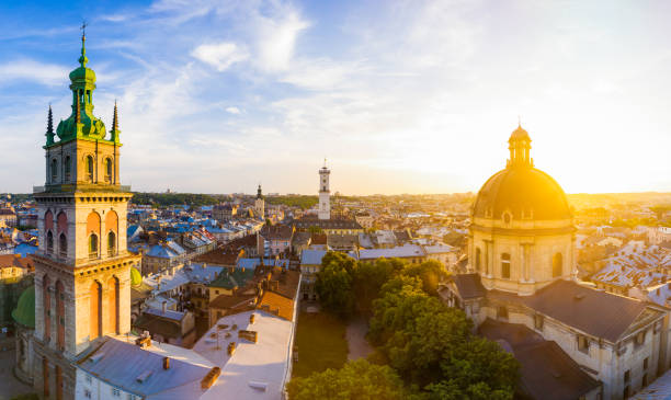 Dominican Church and Dormition Church in Lviv Lviv, Ukraine - August 24, 2020: Aerial view on Dominican Church and Dormition Church in Lviv, Ukraine from drone lviv photos stock pictures, royalty-free photos & images